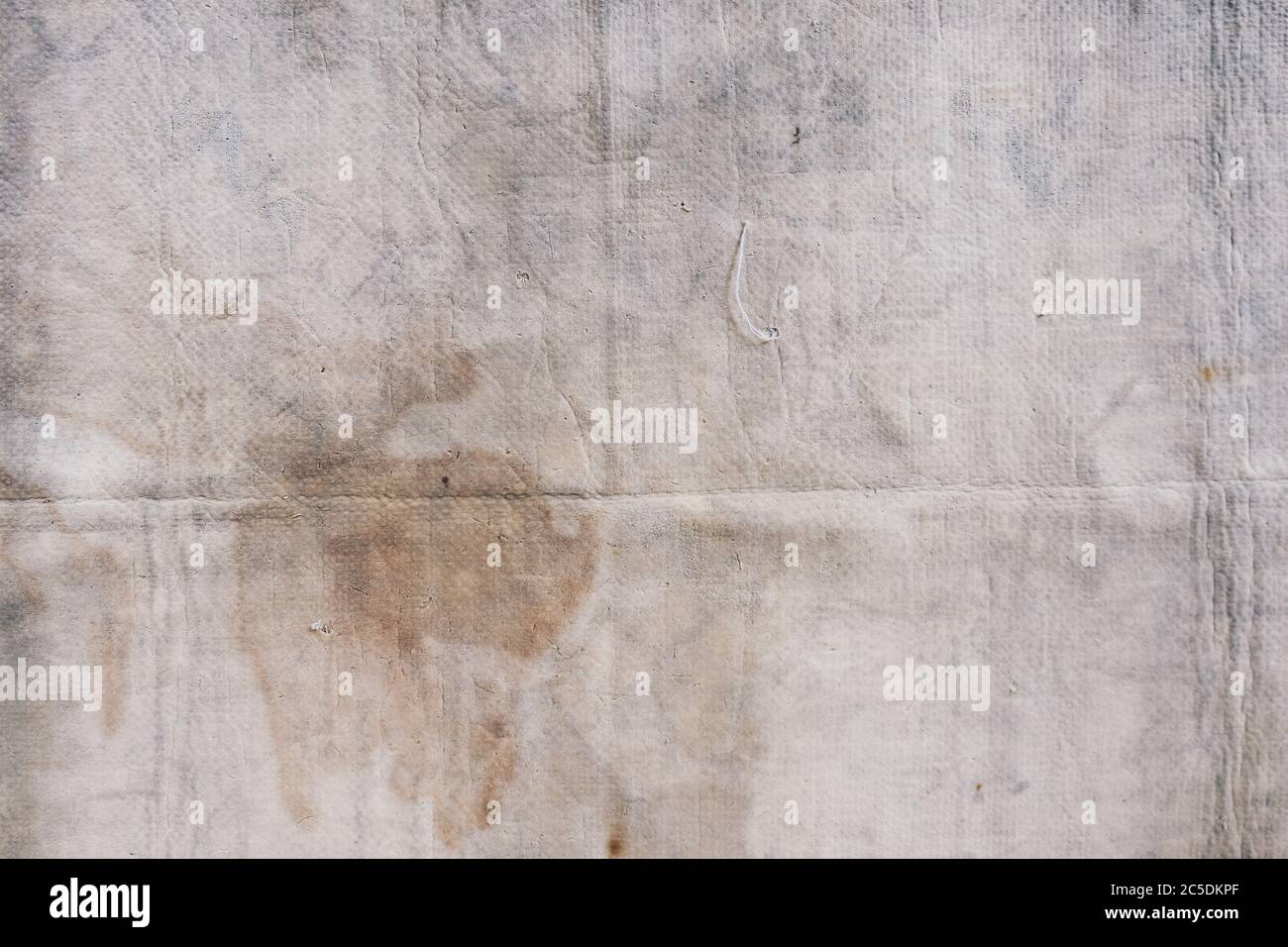 Dirty cleaning rag background texture in white background. Kanebo or ...