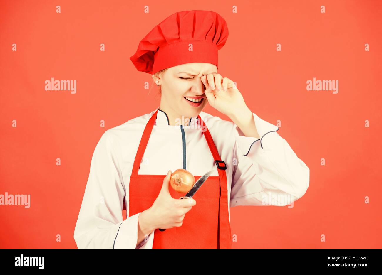 Kitchen routine. Girl cooking healthy meal. Housewife cook crying while
