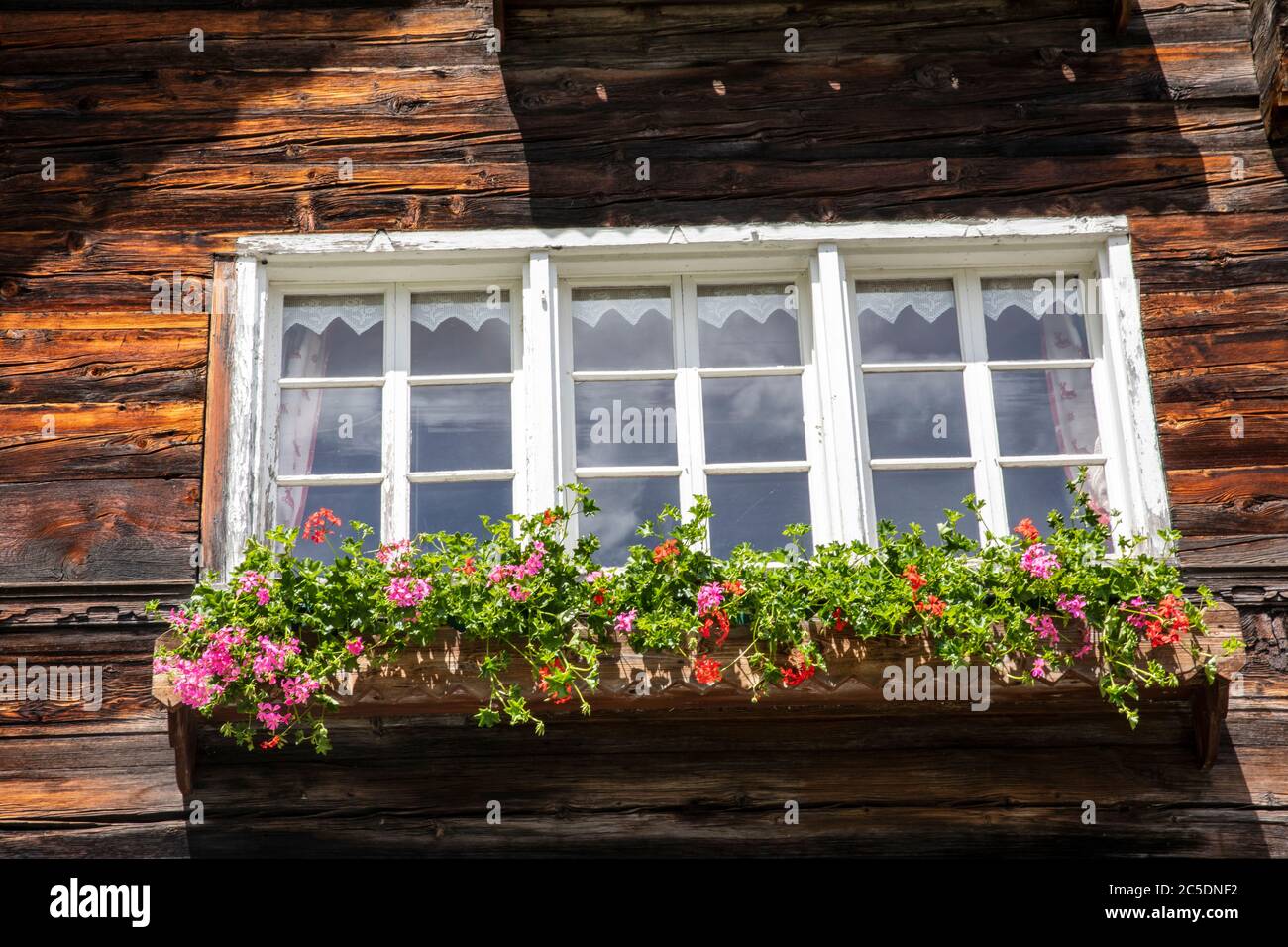 A window at Canza village, Formazza Valley, Ossola Valley, VCO, Piedmont, Italy Stock Photo
