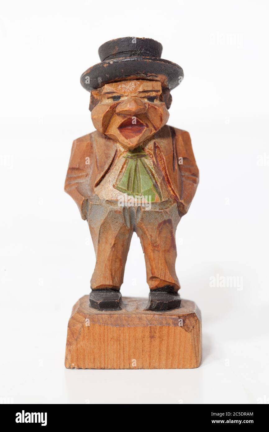 Hand Carved Wooden Figure of Man Stock Photo