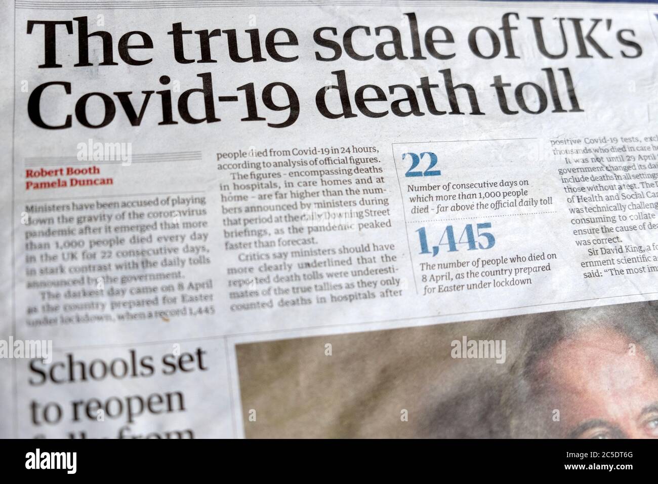 'The true scale of UK's Covid-19 death toll' newspaper headline on front page of the Guardian  20 June 2020 London England UK Stock Photo