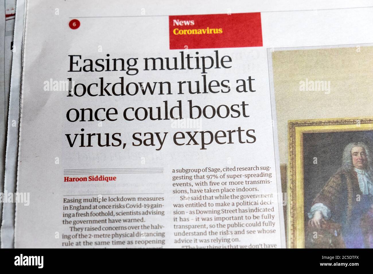 'Easing multiple lockdown rules at once could boost virus, say experts' newspaper headline in Guardian newspaper Coronavirus section 24 June 2020 Stock Photo