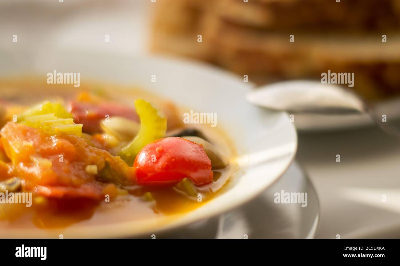 Vegetarian goulash soup served in a white bowl Stock Photo Alamy