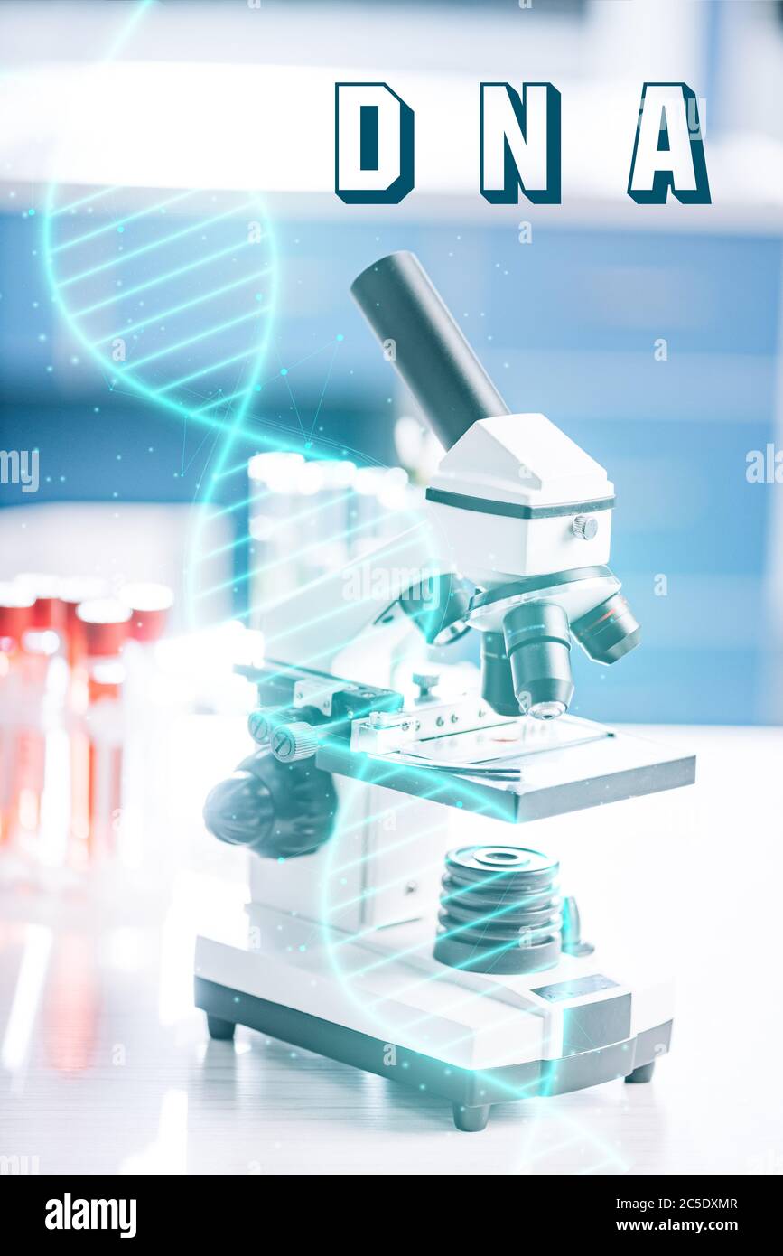 selective focus of microscope near test tubes with samples and dna ...
