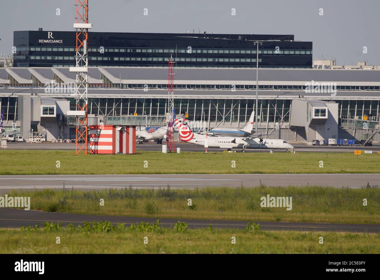 A LOT domestic airliner is seen on the apron at Chopin Airport on July 1, 2020 in Warsaw, Poland. Poland has extended the list of flights to 8 non-EU Stock Photo
