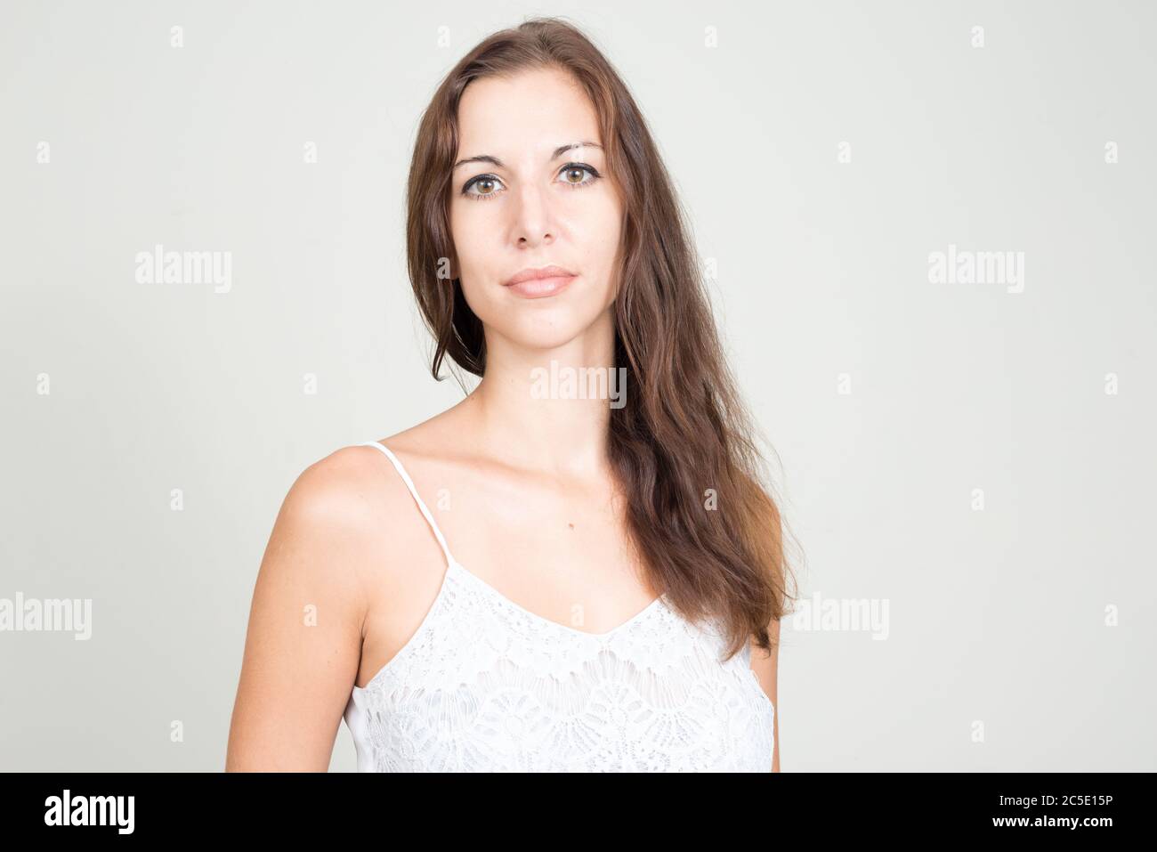 Portrait of young beautiful woman with brown hair Stock Photo - Alamy