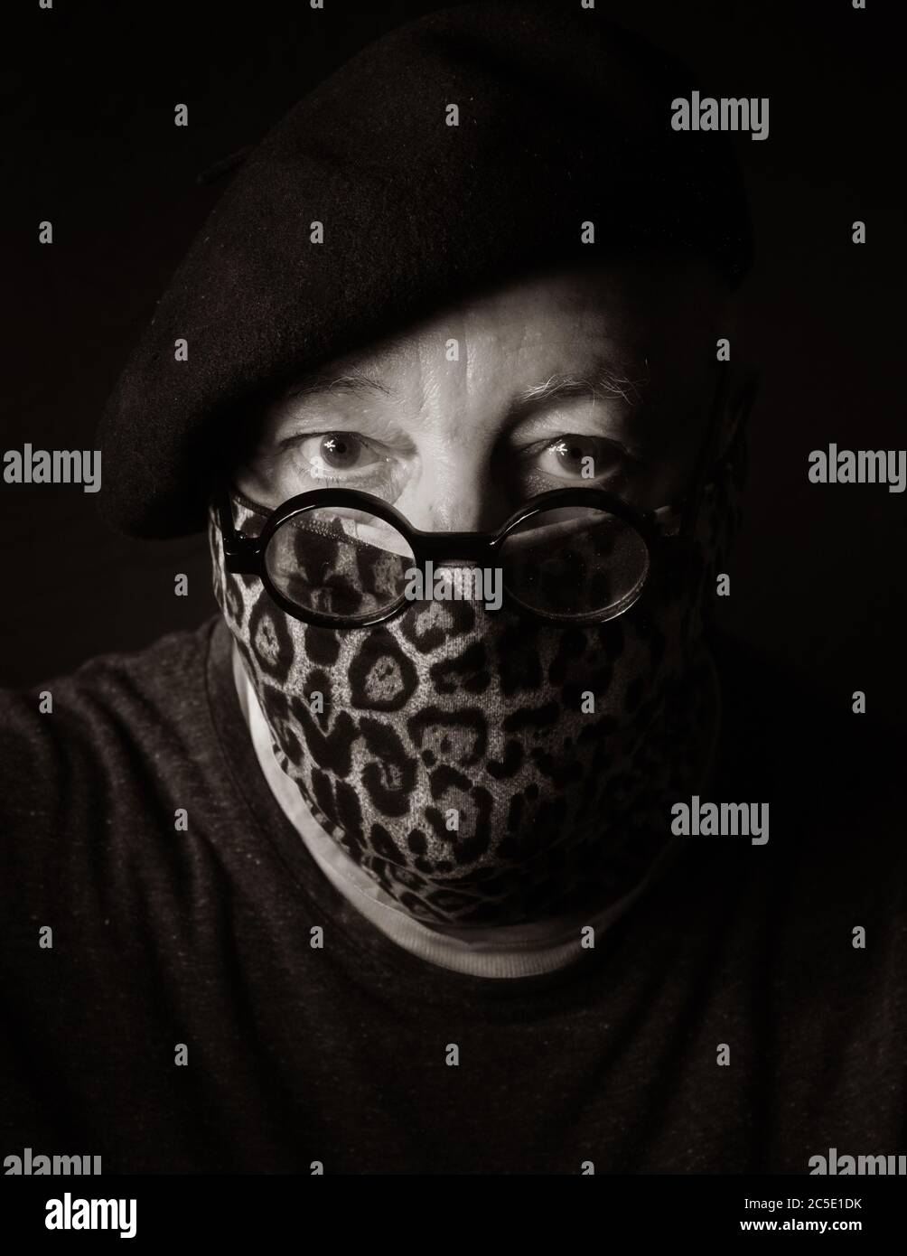 Self Portrait in Leopard Mask Stock Photo