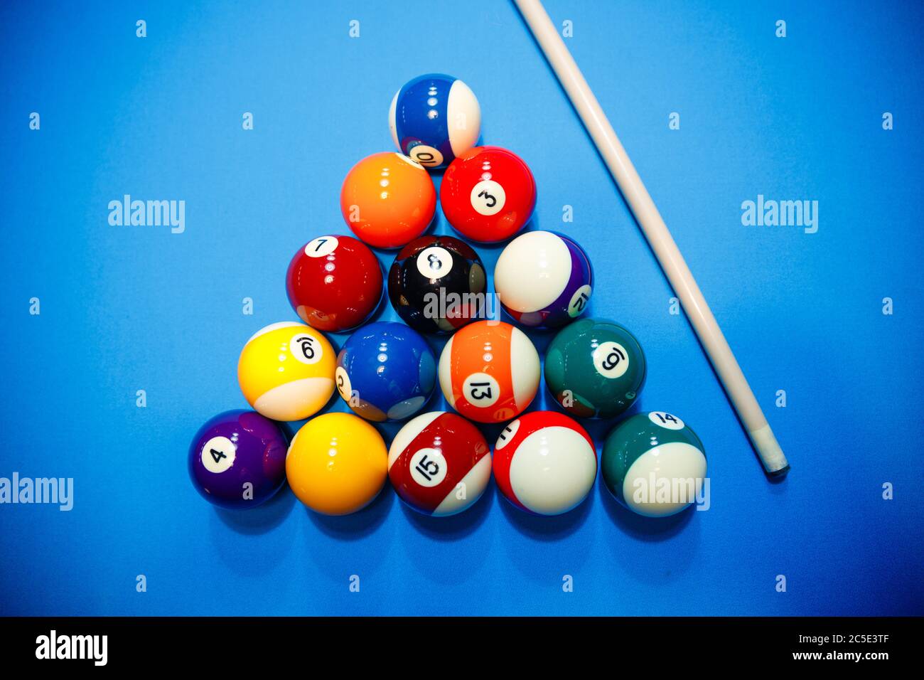 The game of American billiards. Multicolored billiard balls on gaming