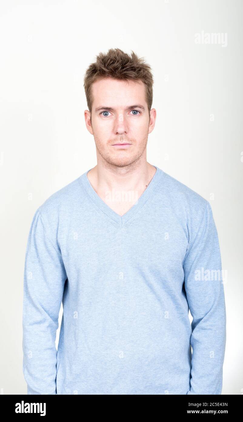 Portrait of handsome man looking at camera Stock Photo - Alamy
