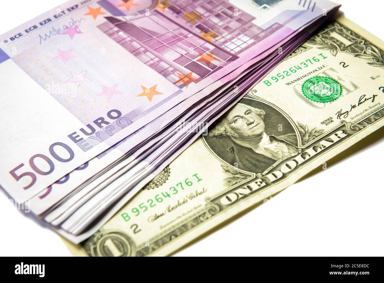 500 euro money banknotes versus 1 dollar. Stack of money cash