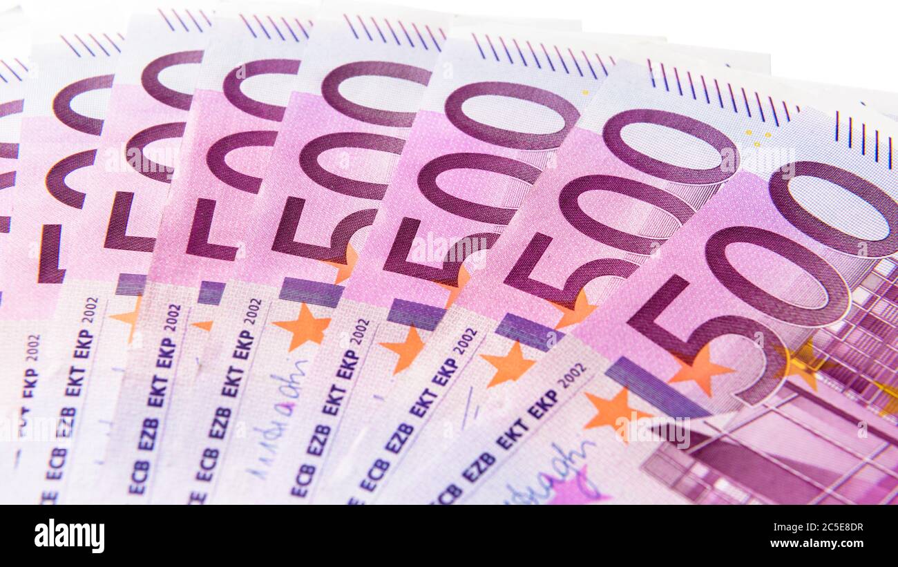 500 euro money banknotes isolated on a white background. Five hundred notes of European Union currency. Fan with euro money cash close-up. Concept of Stock Photo