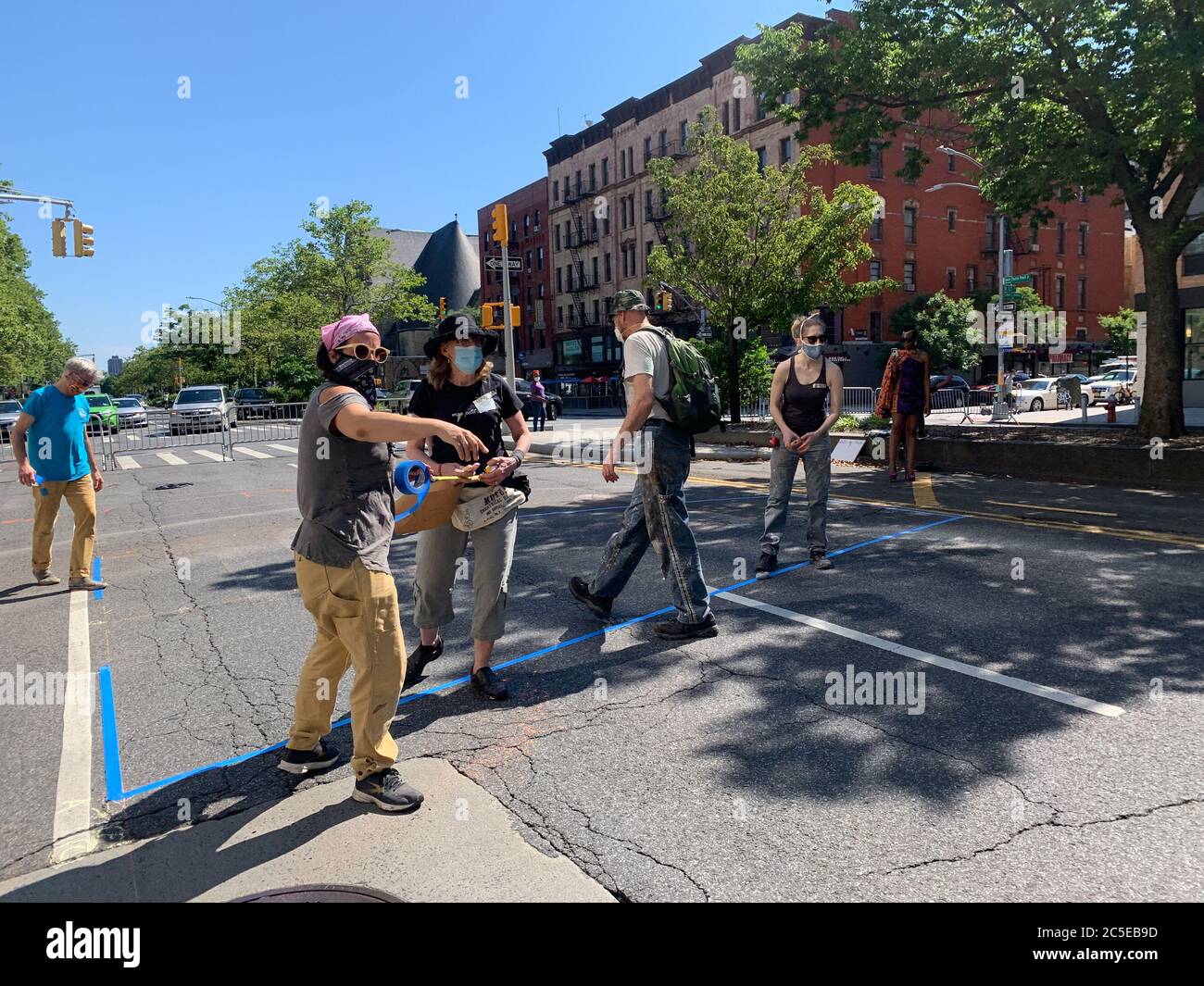 New York, USA. 2nd July, 2020. (NEW) Black lives MatterÃ¢â‚¬â„¢s Mural in Harlem. July 2, 2020, Harlem, New York, USA: Adam Clayton Powell jr Avenue with W 125 to 127 streets, Harlem is closed to the public from today July 2nd till July 5th for the making of Black lives matters mural . They are protesting against the police murder of George Floyd in Minneapolis and police brutality on blacks .Credit : Niyi Fote/Thenews2 Credit: Niyi Fote/TheNEWS2/ZUMA Wire/Alamy Live News Stock Photo