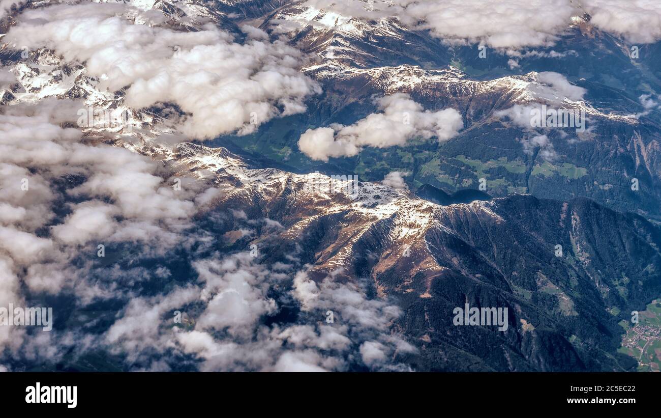 Aerial view of the Alpine mountains from an airplane Stock Photo
