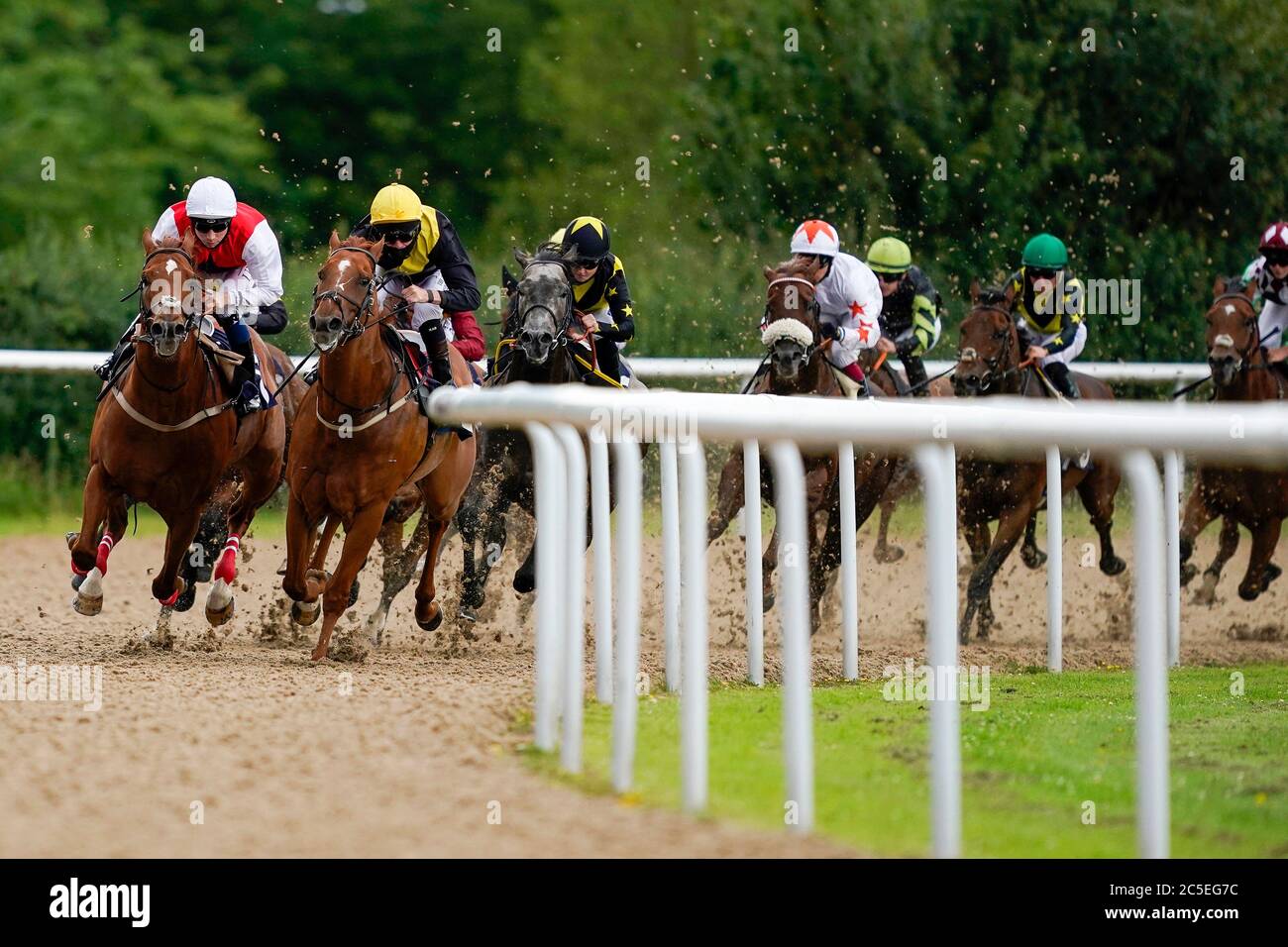 Savalas ridden by Hollie Doyle riding Savalas (third left) go on to win The Sky Sports Racing On Sky 415 Handicap at Wolverhampton Racecourse. Stock Photo