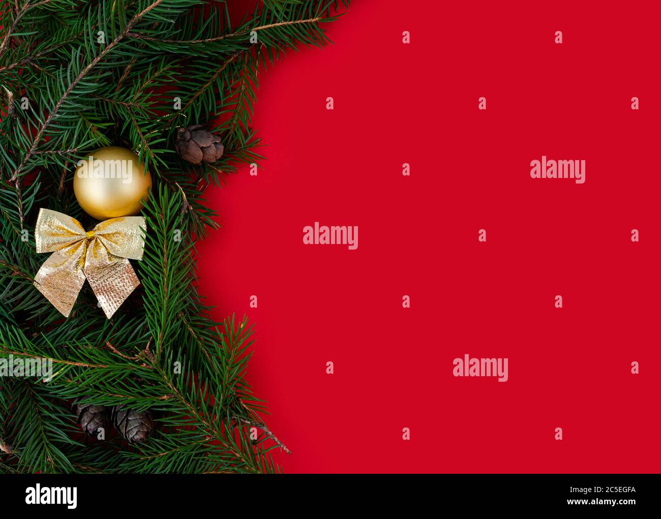 Christmas and New Year red background with fir border Stock Photo