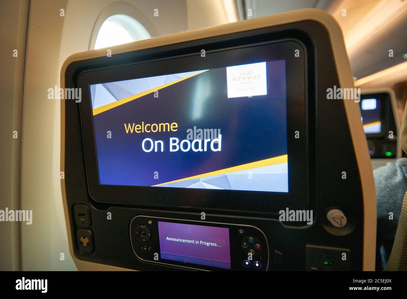 BANGKOK, THAILAND - CIRCA JANUARY, 2020: close up shot of seat back screen on board of Etihad Airways Boeing 787 Dreamliner. Stock Photo