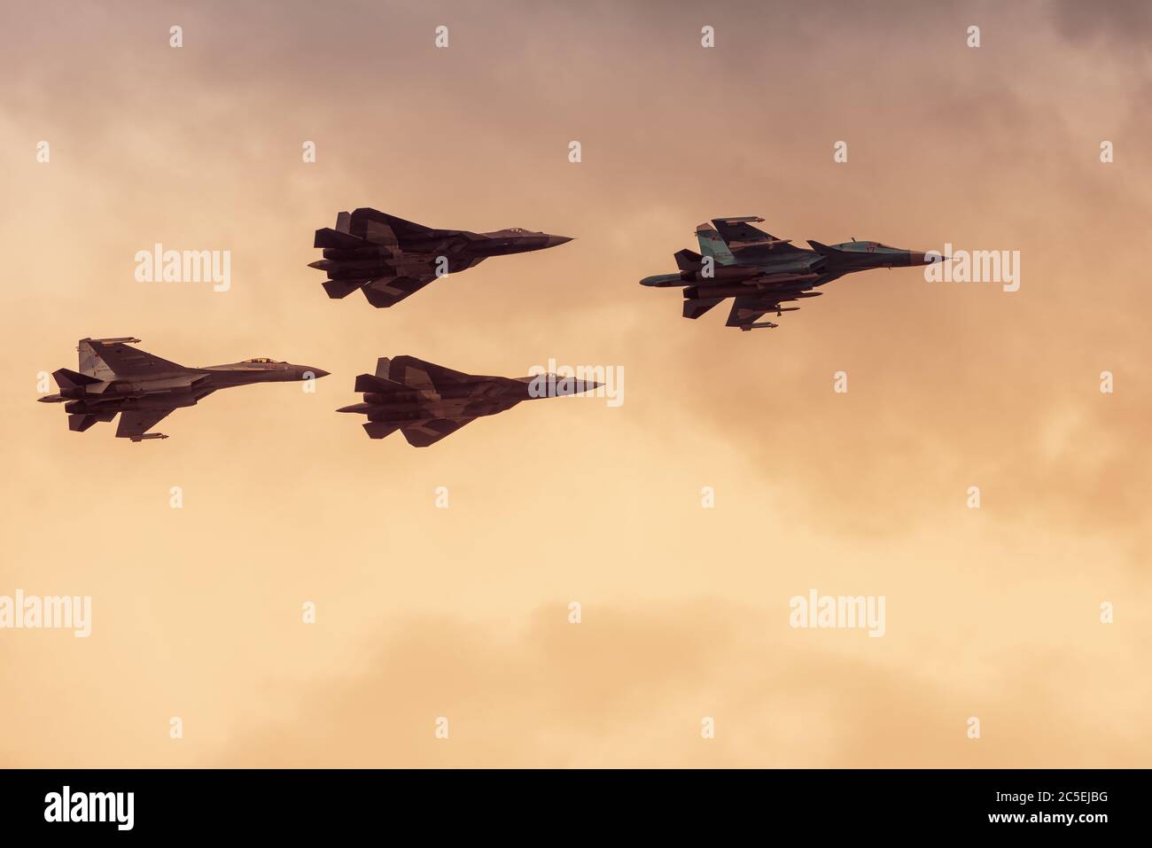 Moscow Region - July 21, 2017: Modern Russian strike fighters Sukhoi Su-35, Su-34 and two newest Su-57 (T-50 PAK FA) at the International Aviation and Stock Photo