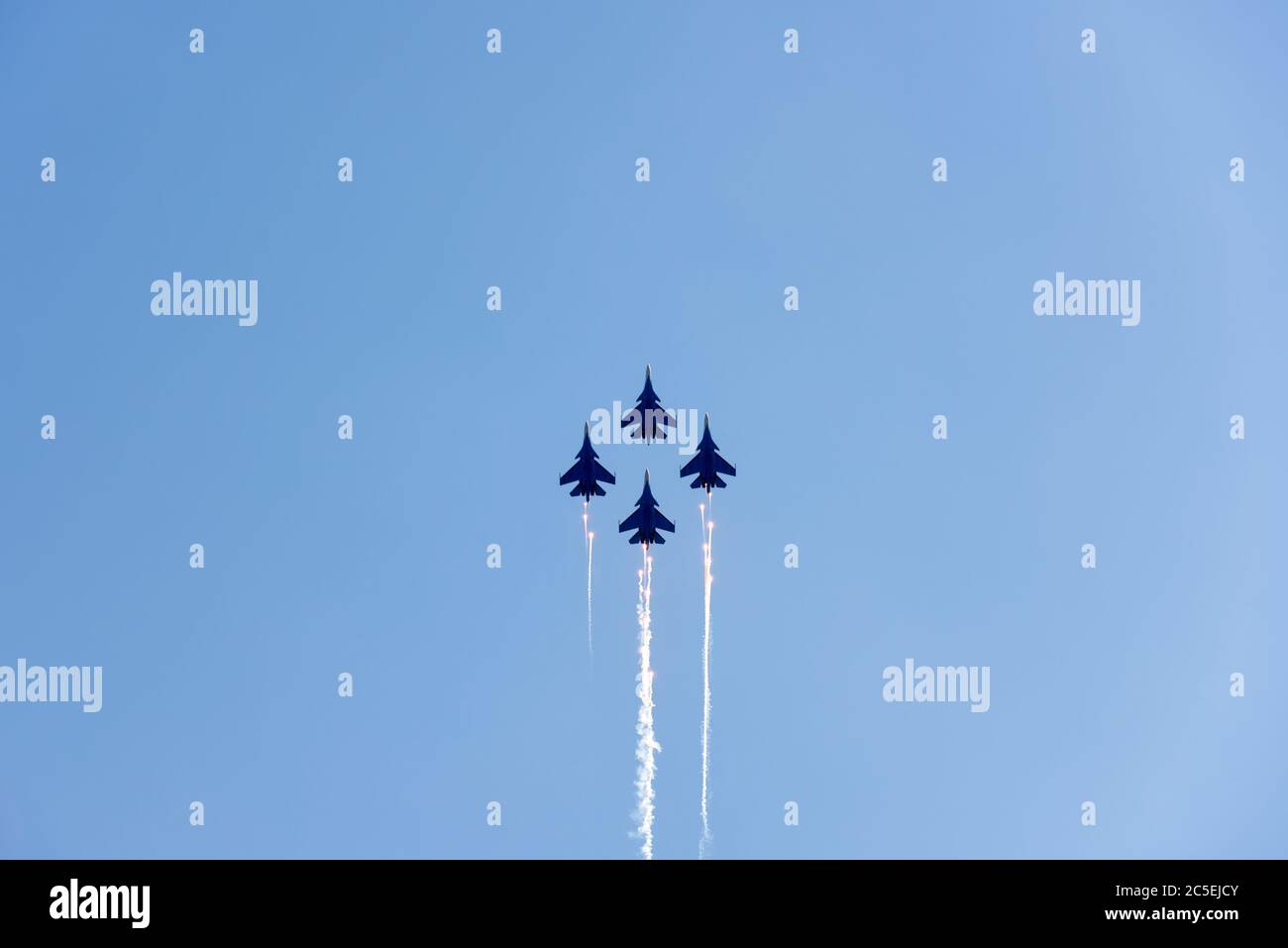 Moscow Region - July 21, 2017: Aerobatic display team Russian Knights on Su-30SM in the blue sky at the International Aviation and Space Salon (MAKS) Stock Photo