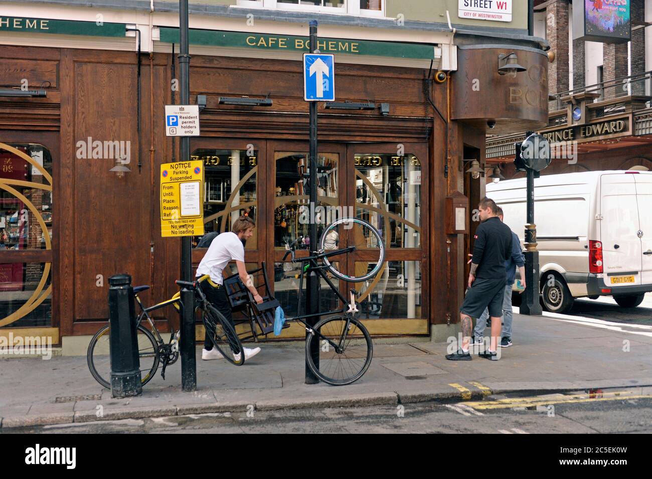 London, UK, 2 July 2020 Cafe Boheme in Old Compton Street prepares to reopen. West End prepares for Super Saturday as pubs open. Many businesses show no sign of opening as the hotel and theatres remain closed and there are no tourists. Credit: JOHNNY ARMSTEAD/Alamy Live News Stock Photo