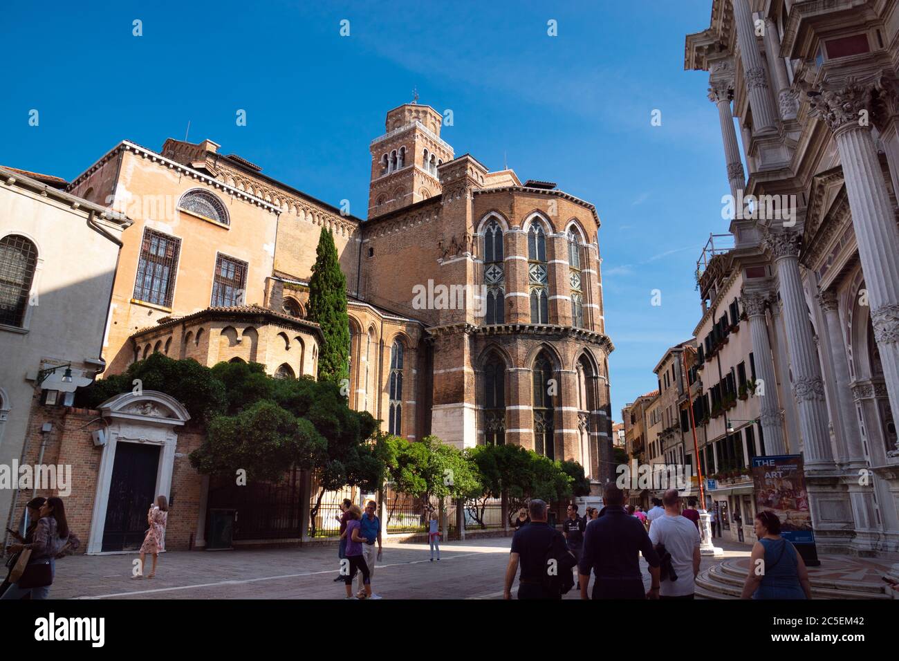 Oct. 1, 2019 - Venice, Italy: view to the Basilica of Frari. Crowded streets full of people. Grand Art Museum of Venice at right side. Stock Photo