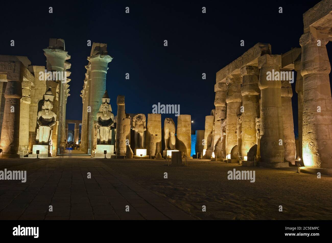 Large statues of Ramses II with columns in hypostyle hall at ancient ...