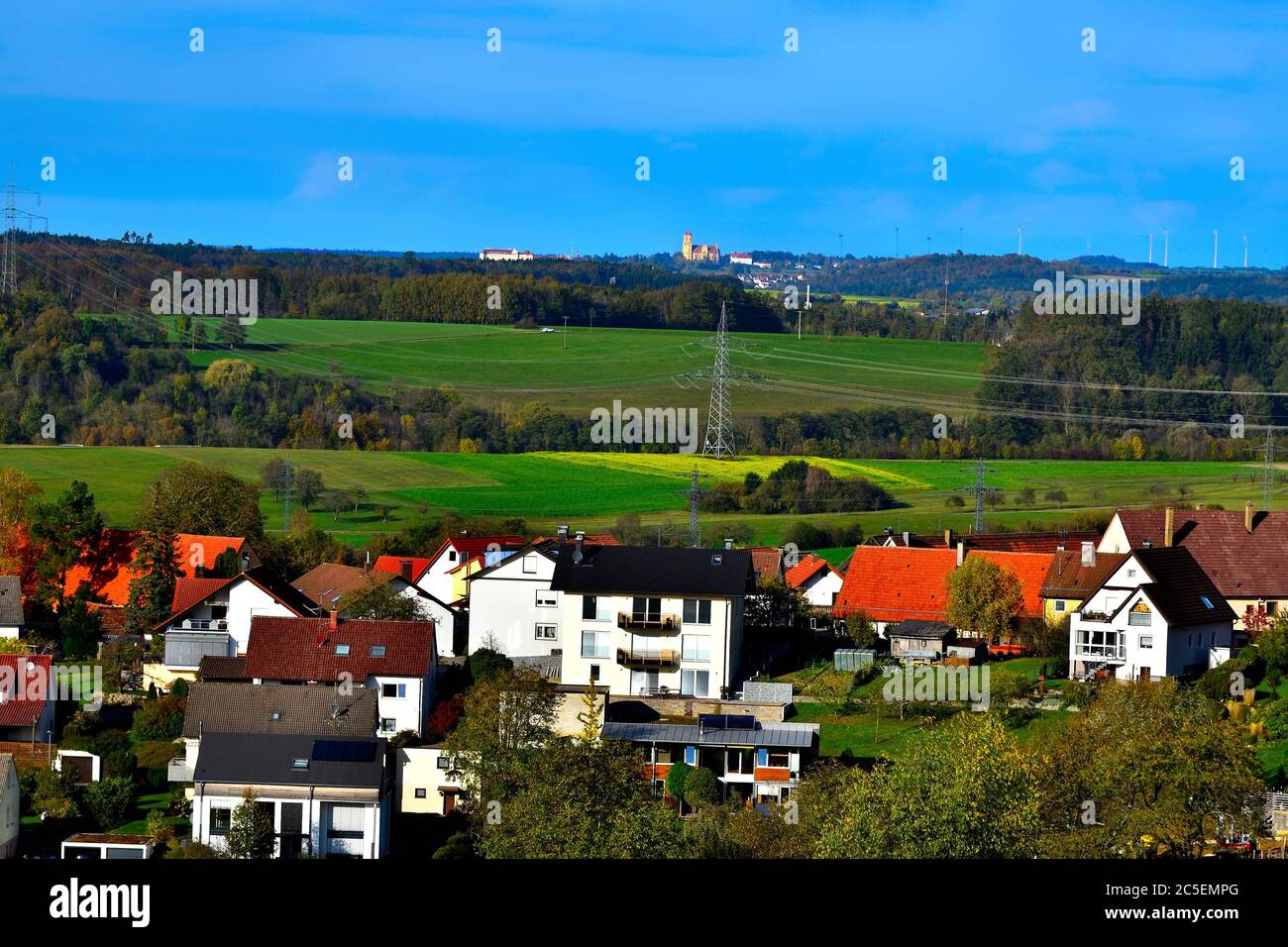 City of Aalen-Wasseralfingen in The Hilly Landscape of The Swabian Alb, Medieval Castle and Monastery of Ellwangen in The Background, Germany, Europe Stock Photo