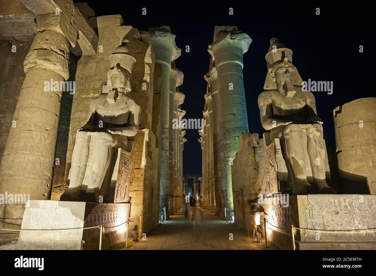 Large statues of Ramses II with columns in hypostyle hall at ancient ...