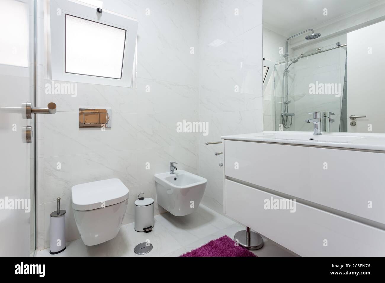 Modern stylish bathroom in the house, hotel, in white colors. Conceptual photo. Stock Photo