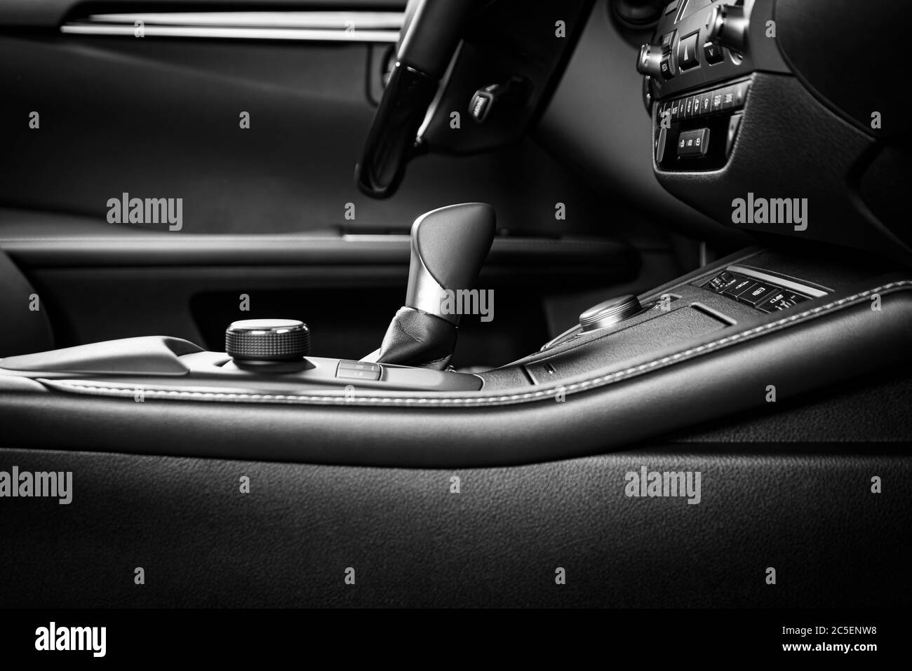 Modern luxury car Interior steering wheel, shift lever and dashboard