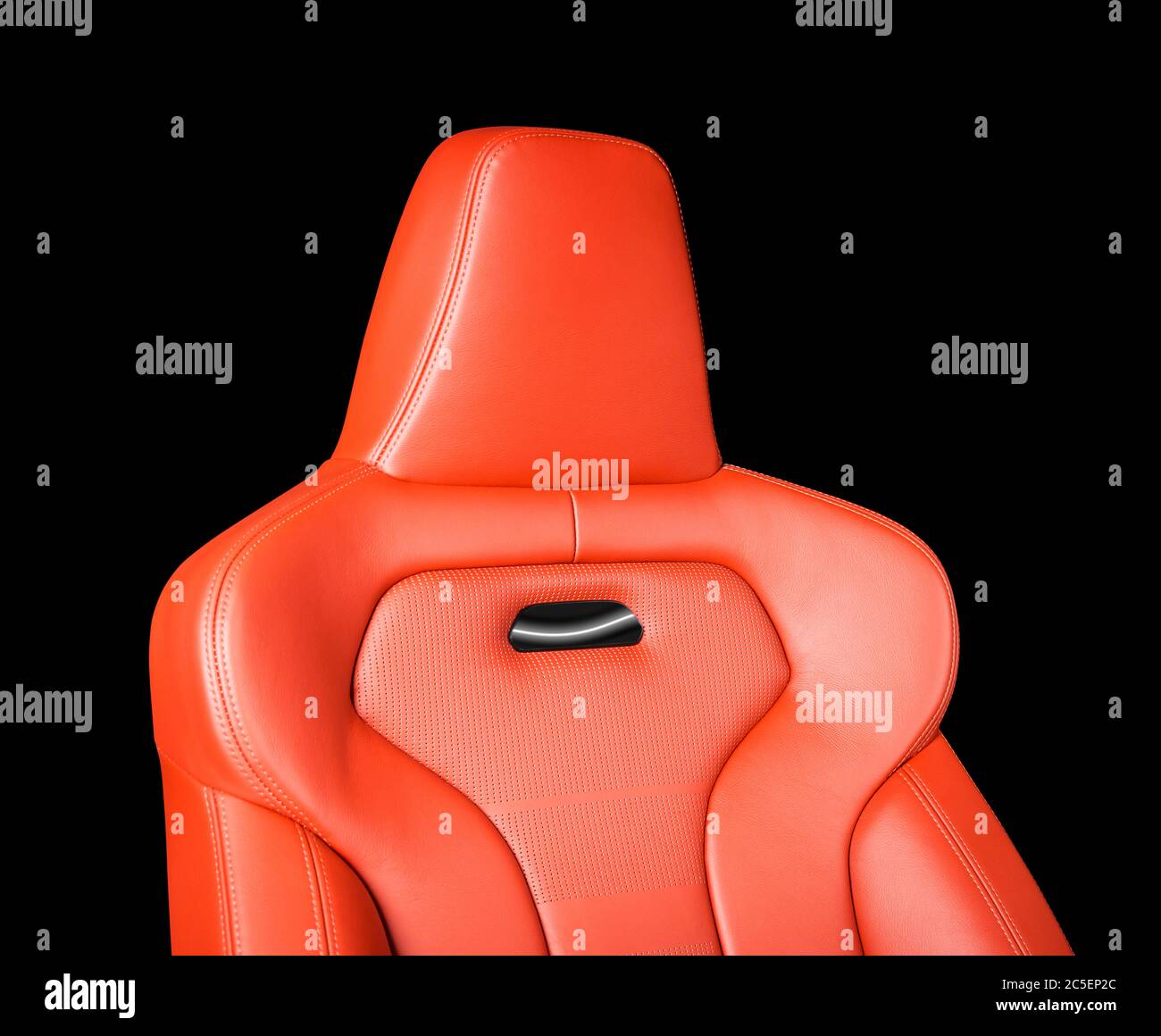 Comfortable leather seat. Red perforarated leather car seat isolated on black background with copy space Stock Photo