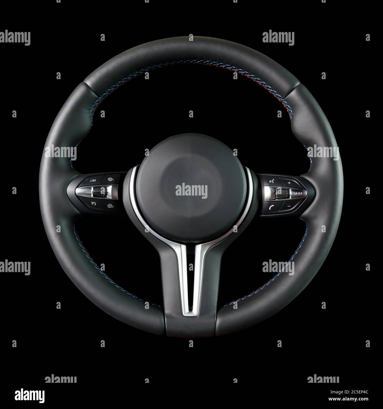 Steering wheel, isolated on the black background Stock Photo - Alamy