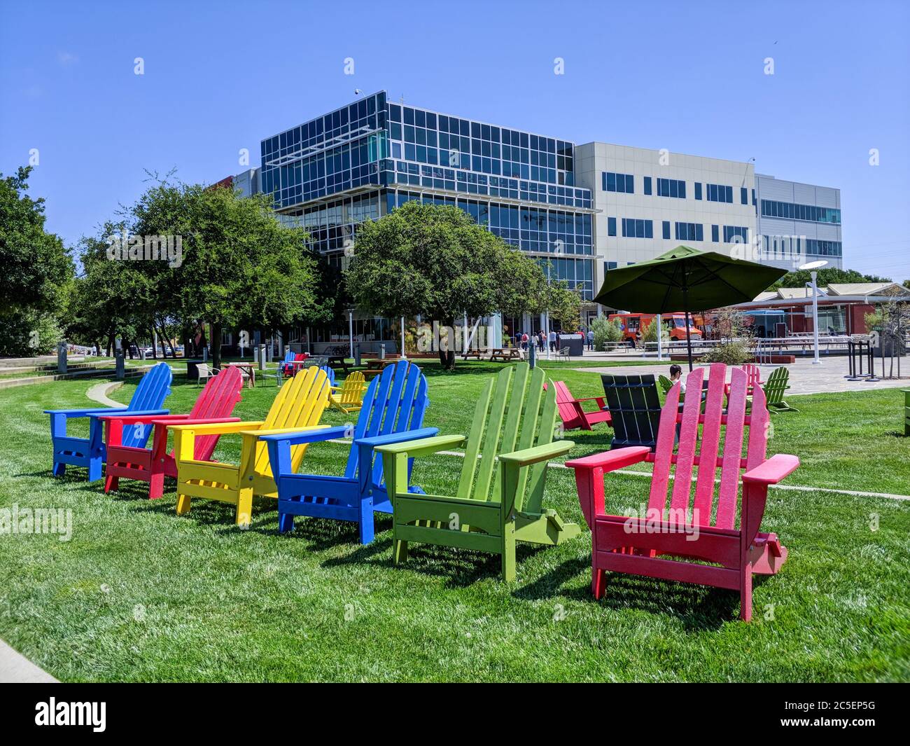 Mountain view, CA, United States - Jan 15, 2018: Google Crittenden Campus on a beautiful sunny day lawn chairs blue sky Stock Photo