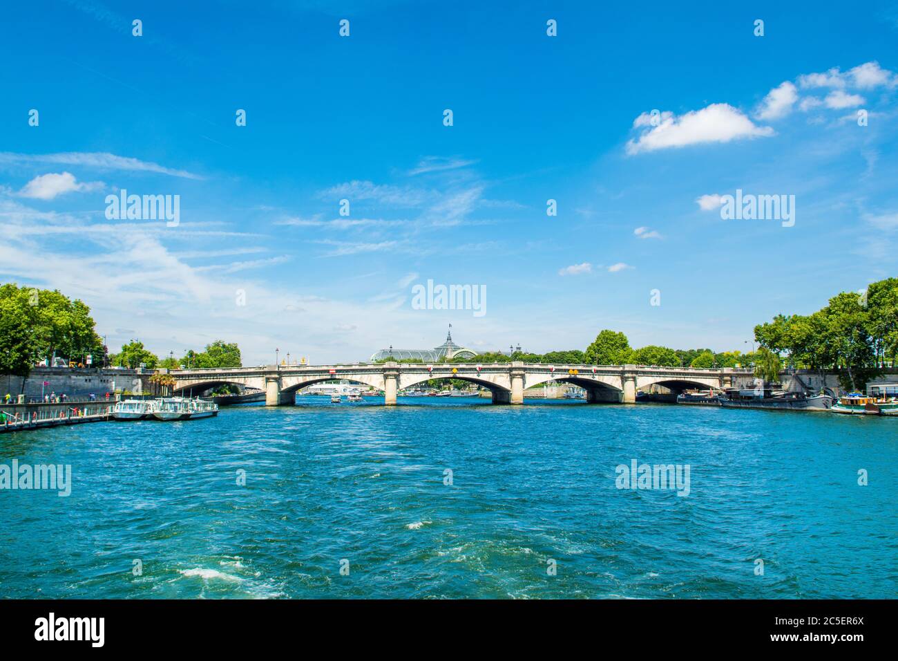 Paris, France - 25 June 2019: Landscape with The Pont de la Concorde bridge over River Seine, connecting the Quai des Tuileries and the Quai d'Orsay Stock Photo