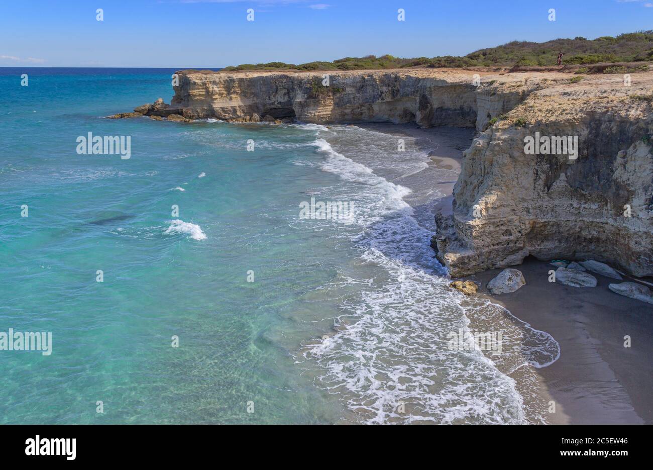 The most beautiful coast of Apulia: Torre Sant' Andrea, Otranto, ITALY (Lecce).Typical coastline of Salento: seascape with cliffs, rocky arch and sea. Stock Photo