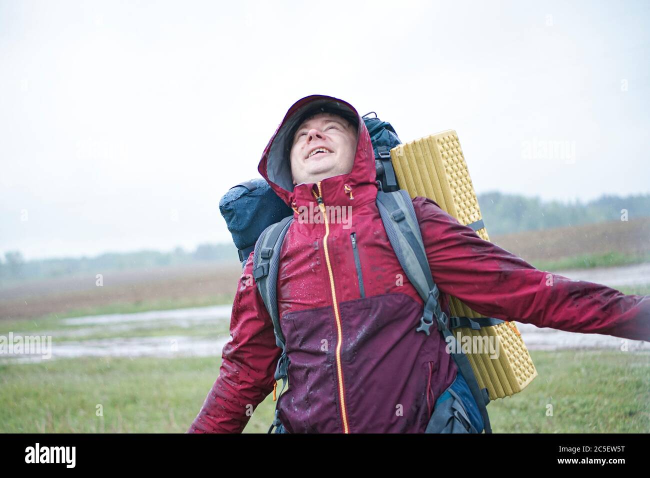 Person in rain coat storm hires stock photography and images Alamy