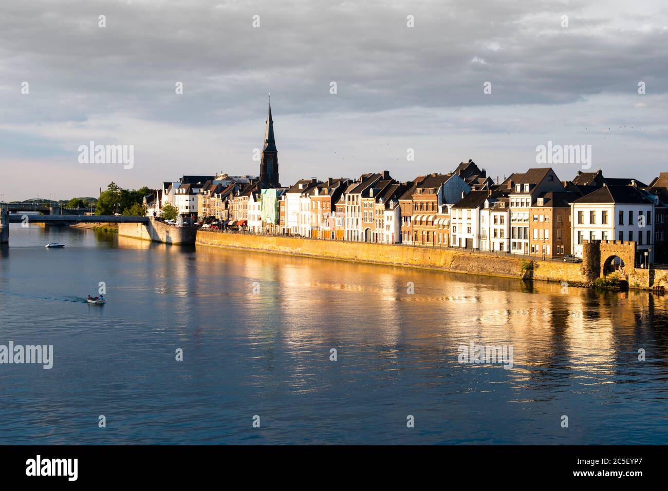 Maastricht Netherlands and Maas River with gold sun lights Stock Photo