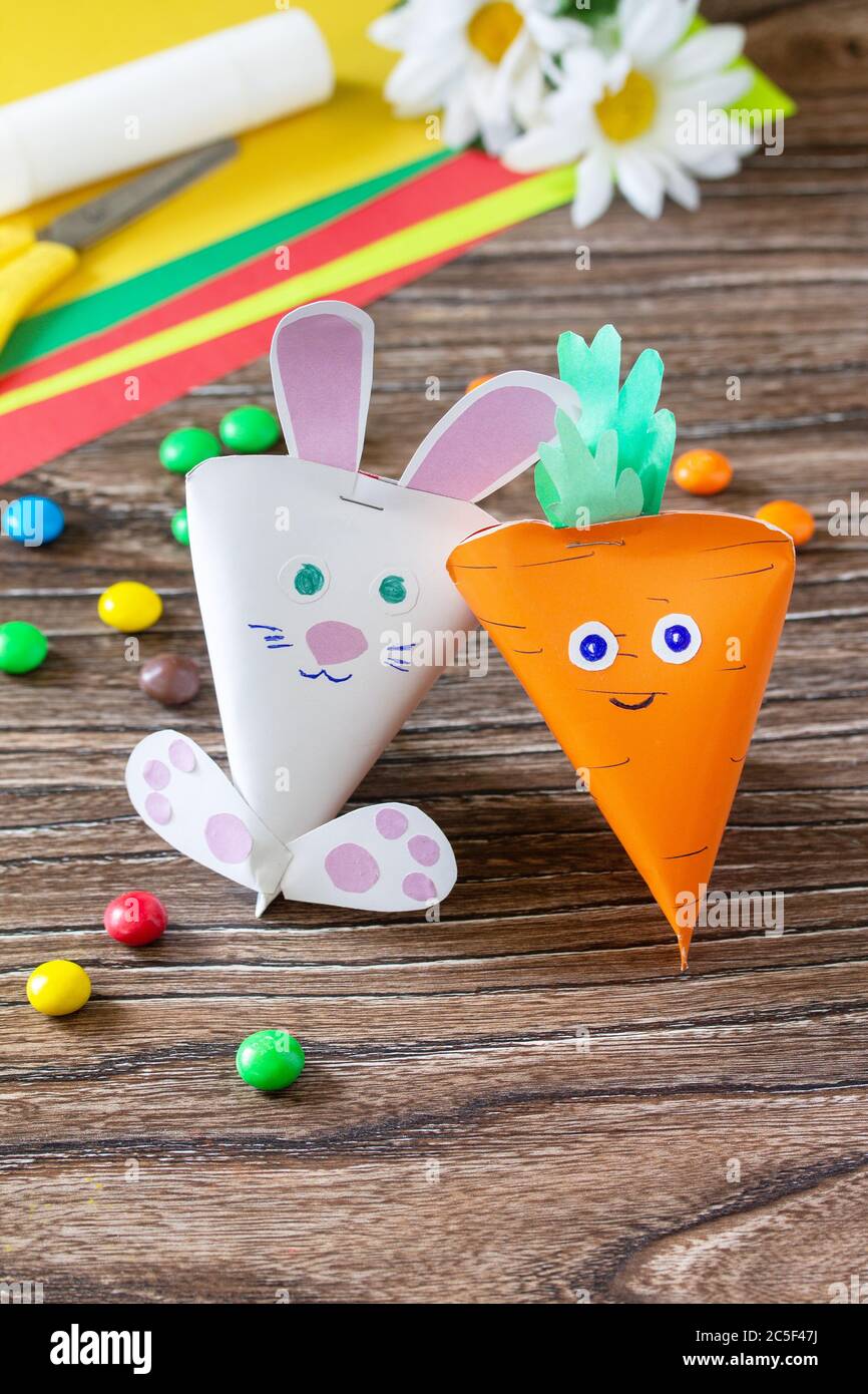 Sweet summer gift with sweets for birthday. Making the packaging in the  form of carrots and Bunny. Handmade. Project of children's creativity,  handicr Stock Photo - Alamy