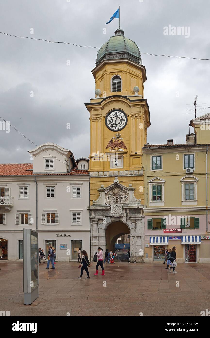 Rijeka, Croatia - October 17, 2014: Clock tower and CIty Gate Landmark Tower at Korzo Street in Downtown Rijeka, Croatia. Stock Photo