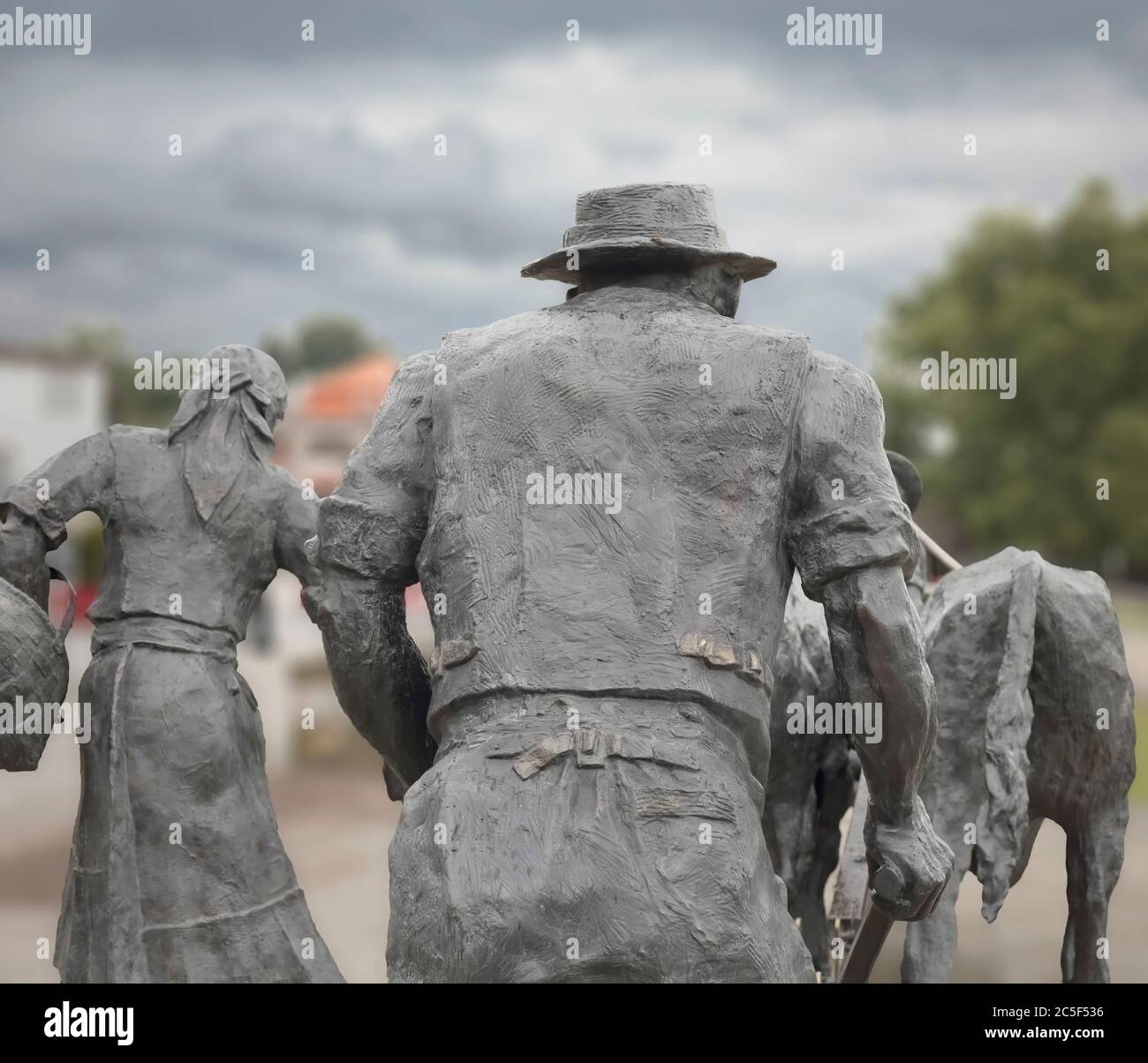 Bronze sculpture farmer hires stock photography and images Alamy