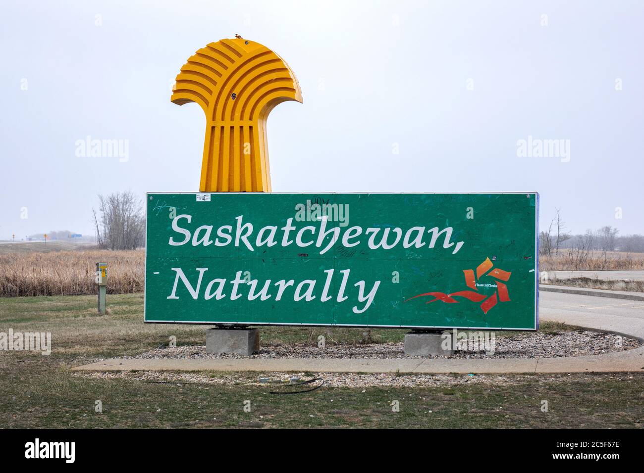 Saskatchewan Provincial Boundary Sign With Manitoba On The Trans Canada Highway Provincial Slogan Saskatchewan Naturally Stock Photo