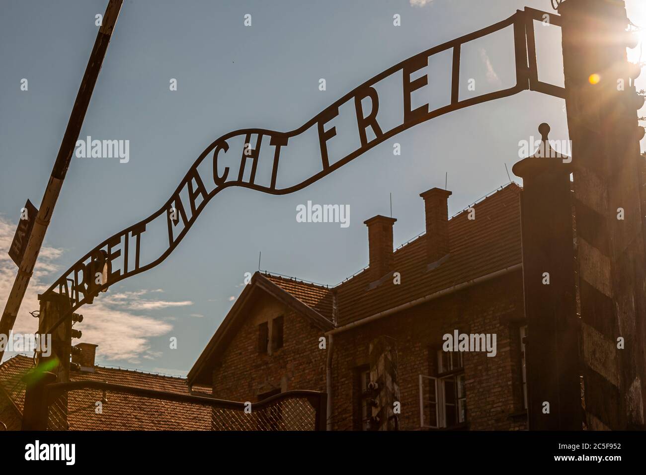 Concentration Camp Auschwitz. Monument against genocide. Inscription: 'Work makes free' Stock Photo
