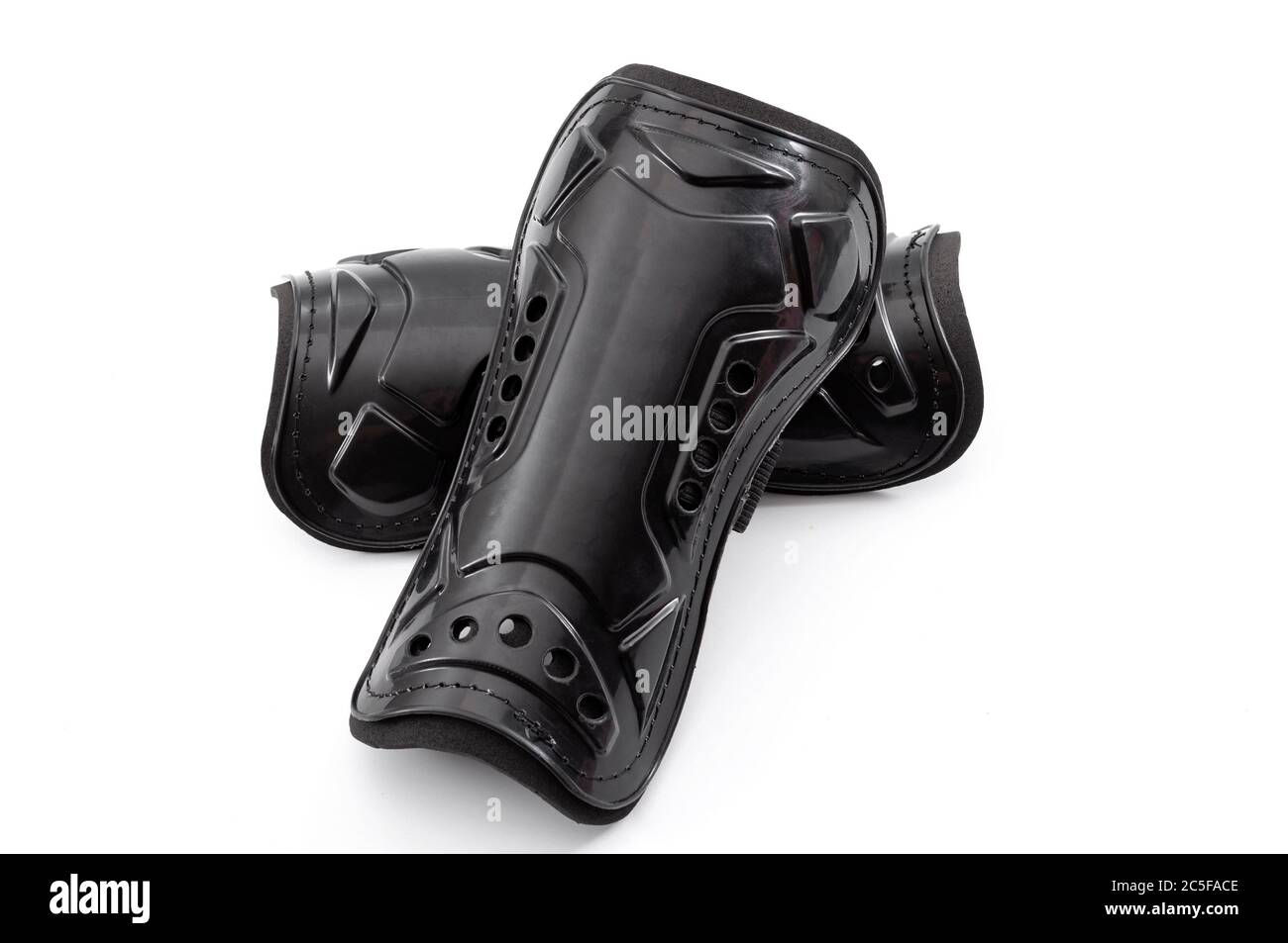 Football equipment, injury and bruise prevention and soccer gear concept with tough black shin