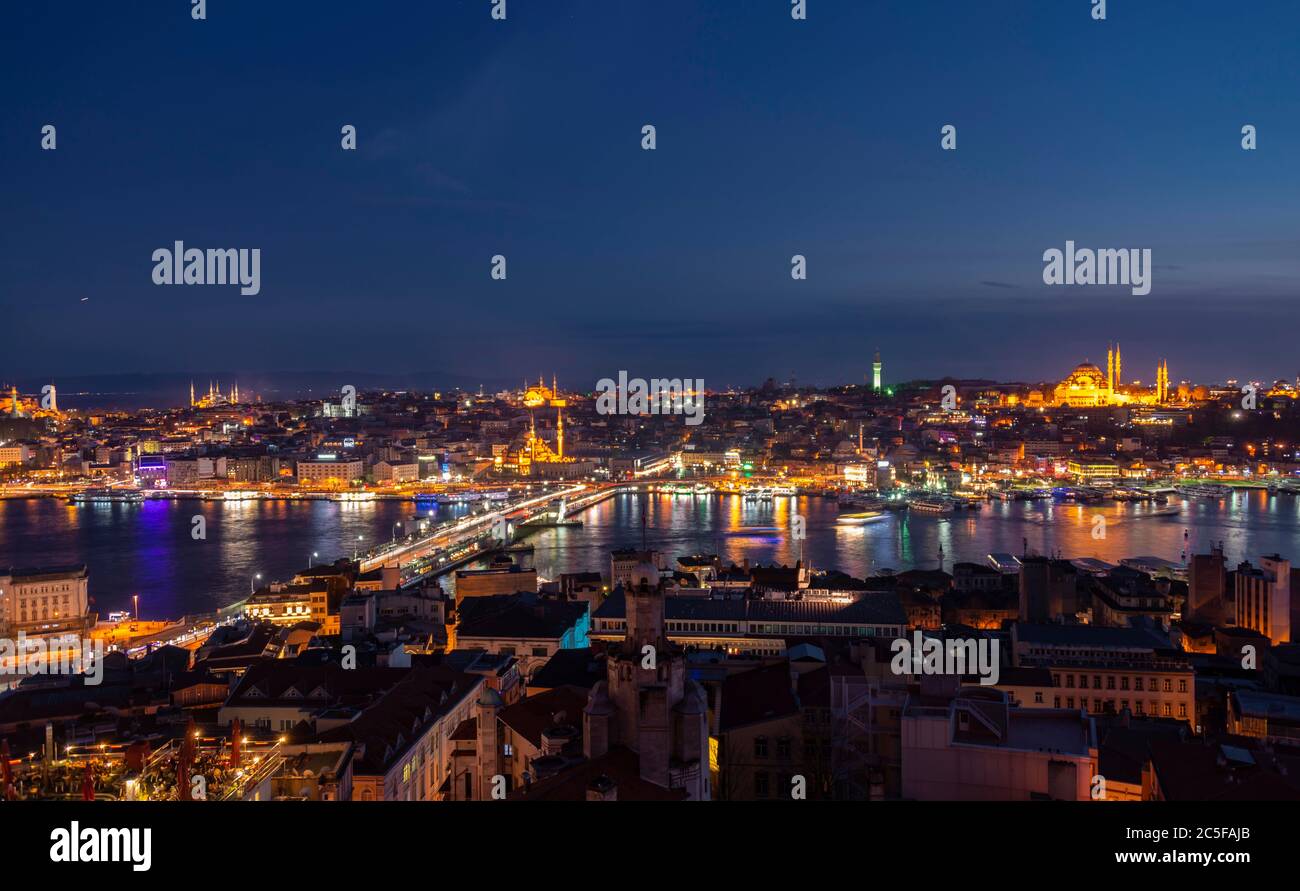 City view at night, Mosque Yeni Cami and Beyazit Camii, Mosque Sultan Ahmet Camii and Hagia Sophia, Sueleymaniye Camii, Galata Bridge, Golden Horn Stock Photo