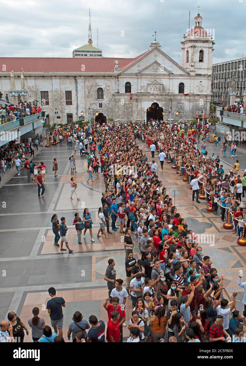 Crowd with pilgrims in Basilica, Pilgrimage Center of the Basilica Minore del Santo Nino, Cebu City, Cebu, Central Visayas, Philippines Stock Photo