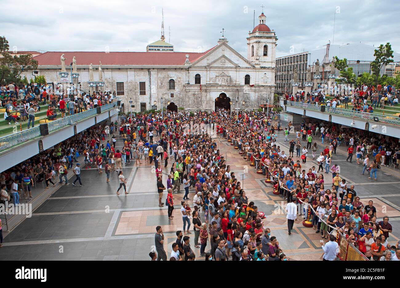 Crowd with pilgrims in Basilica, Pilgrimage Center of the Basilica Minore del Santo Nino, Cebu City, Cebu, Central Visayas, Philippines Stock Photo