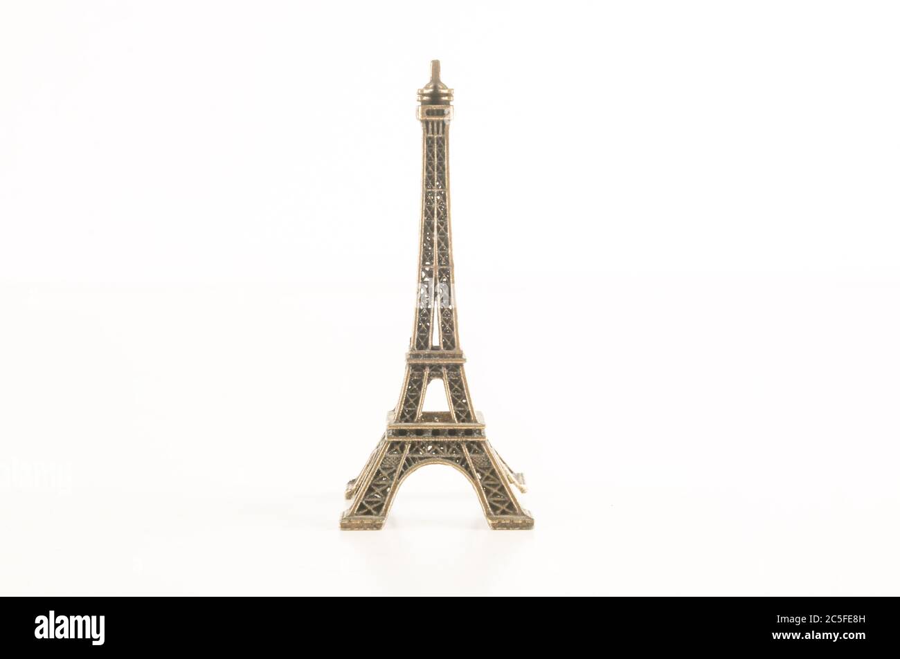 Eiffel Tower toy miniature on white background Stock Photo - Alamy
