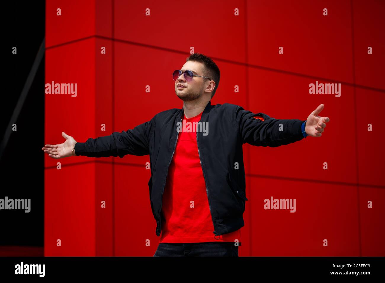 black jeans and red shirt