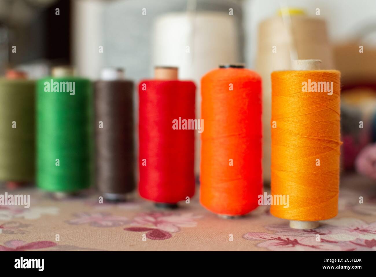 Cotrast colors threads on table Stock Photo
