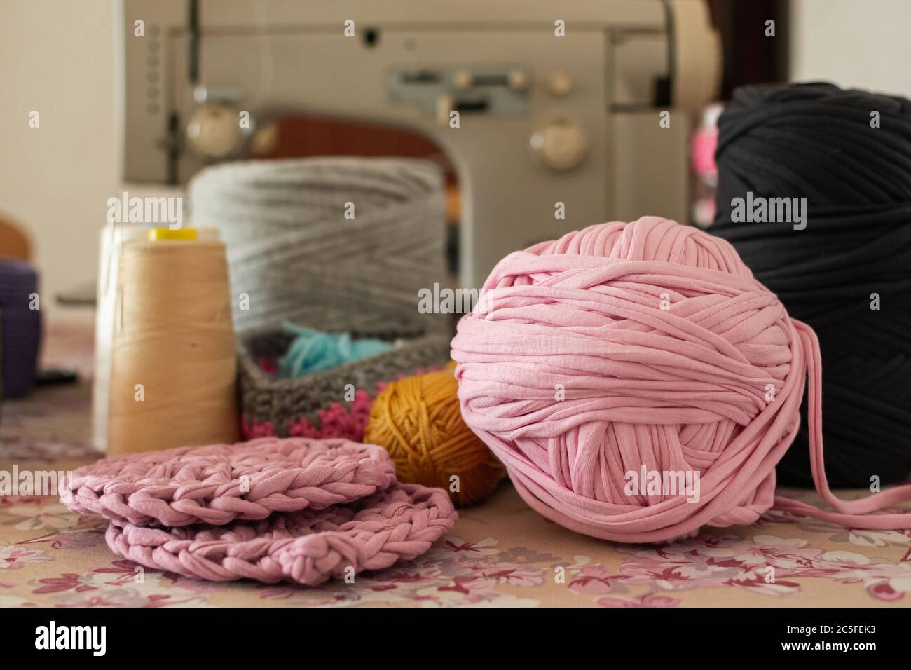 A ball of wool on table, colorful Stock Photo