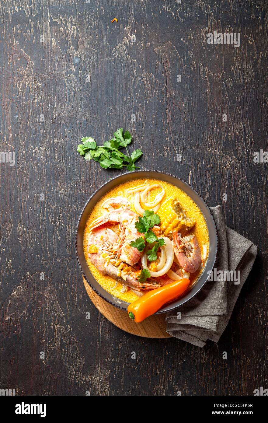 Peruvian seafood soup Chupe de Camarones in gray bowl, top view Stock ...